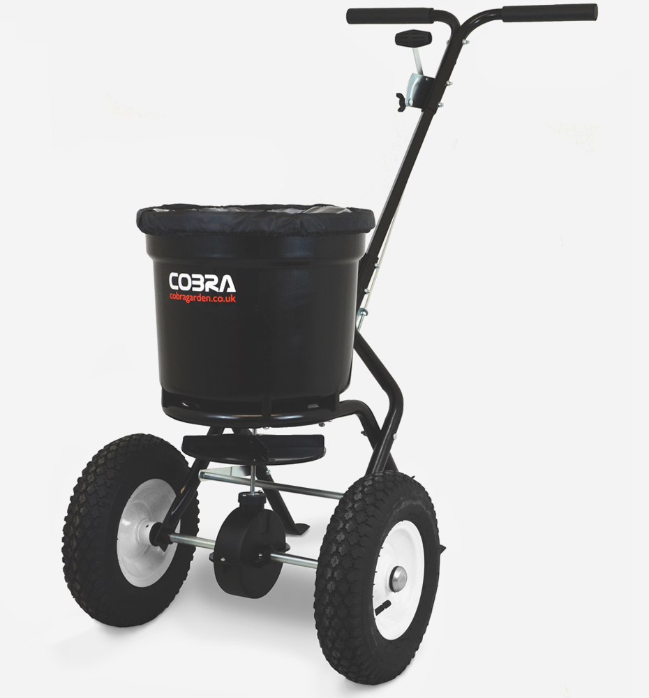 Cobra lawn spreader pictured at angle with a white background