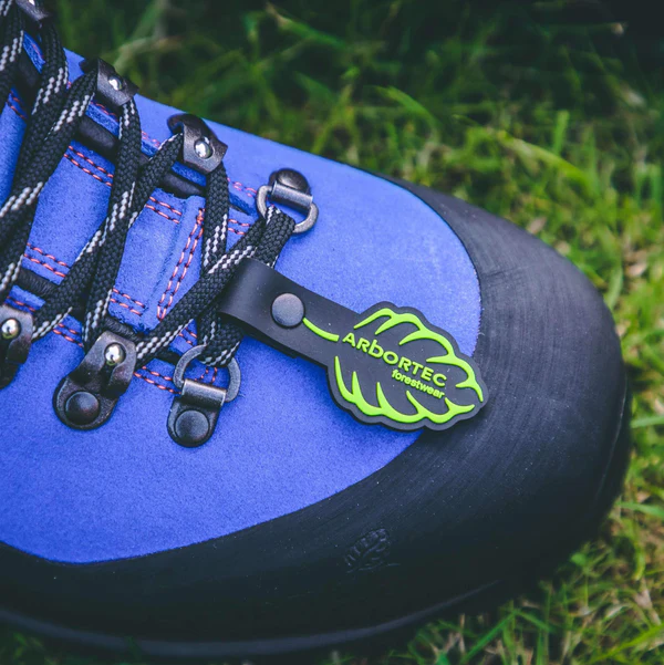 Arbortec AT33200 Scafell Lite Class 2 Chainsaw Boot Blue pictured up close of the toe box on grass